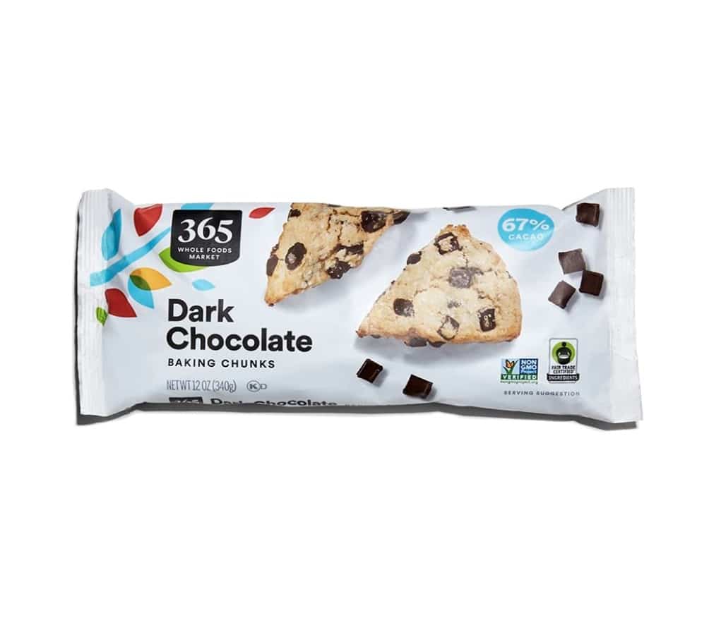 A package of 365 Whole Foods Market Dark Chocolate Baking Chunks. Perfect for your favorite Chocolate Chip Bars Recipe, the wrapper shows cookies and dark chocolate chunks, with 67% cacao and a net weight of 12 oz (340g).
